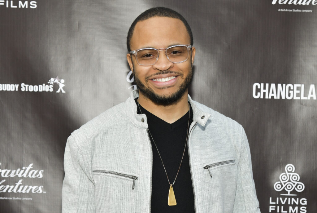 Eugene Byrd smiles for the camera while attending the LA Premiere of Gravitas Ventures' "Changeland" at ArcLight Hollywood on June 03, 2019 in Hollywood, California. 