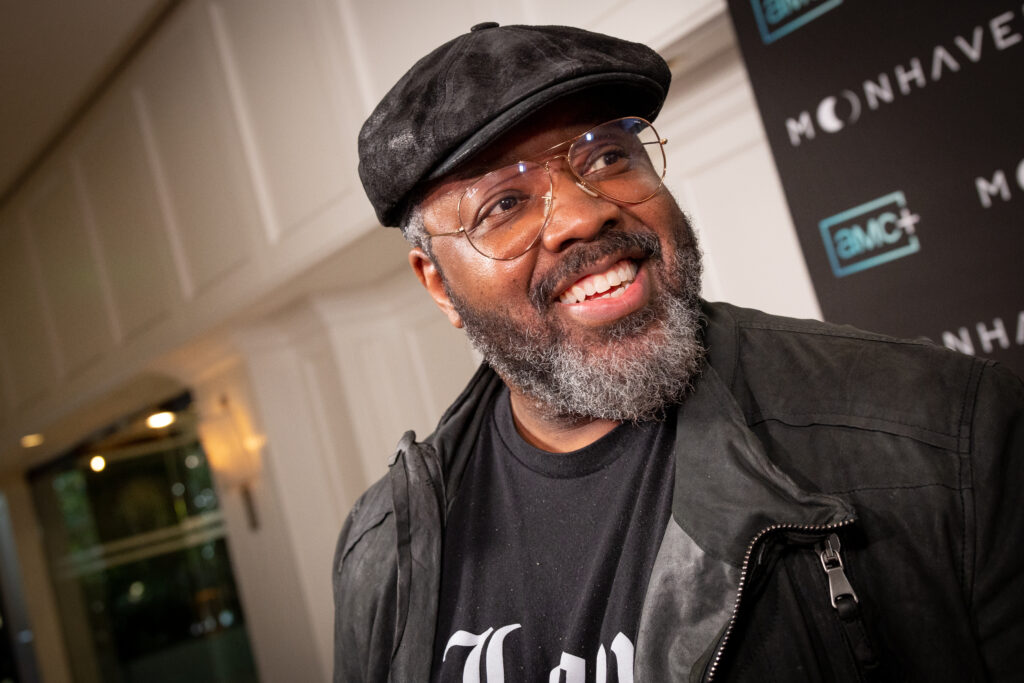 Kadeem Hardison, wearing a black cap and coat, attends the AMC+ original series 'Moonhaven' premiere at The London West Hollywood at Beverly Hills on June 28, 2022 in West Hollywood, California. 