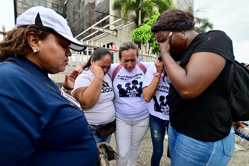 Relatives react after it was confirmed that the burned bodies found in Taura correspond to the four minors who went missing during a military operation outside the courthouse in Guayaquil, Ecuador, on December 31, 2024.