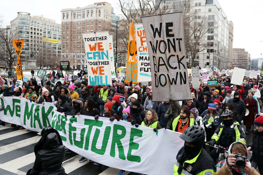 People's March: Thousands March To Protest Trump, GOP Policies Ahead Of Inauguration