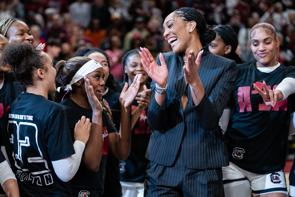 COLUMBIA, SOUTH CAROLINA - FEBRUARY 02: Former South Carolina Gamecocks player A'ja Wilson celebrates with the team after her jersey retirement ceremony before the game against the Auburn Tigers at Colonial Life Arena on February 02, 2025 in Columbia, South Carolina.  