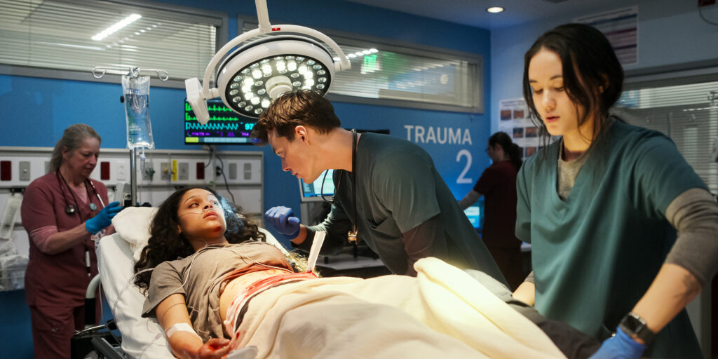 PULSE. (L to R) Ash Santos as Nia Washington, Jack Bannon as Tom Cole, and Chelsea Muirhead as Sophie Chan in Episode 102 of Pulse. Cr. Courtesy of Netflix © 2025