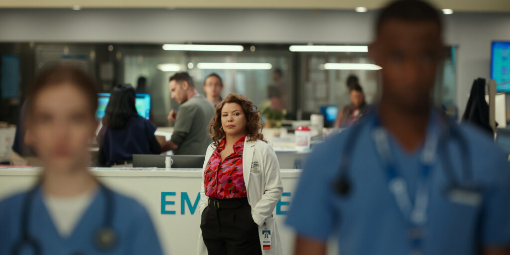 PULSE. Justina Machado as Dr. Natalie Cruz in Episode 107 of Pulse. Cr. Courtesy of Netflix © 2025