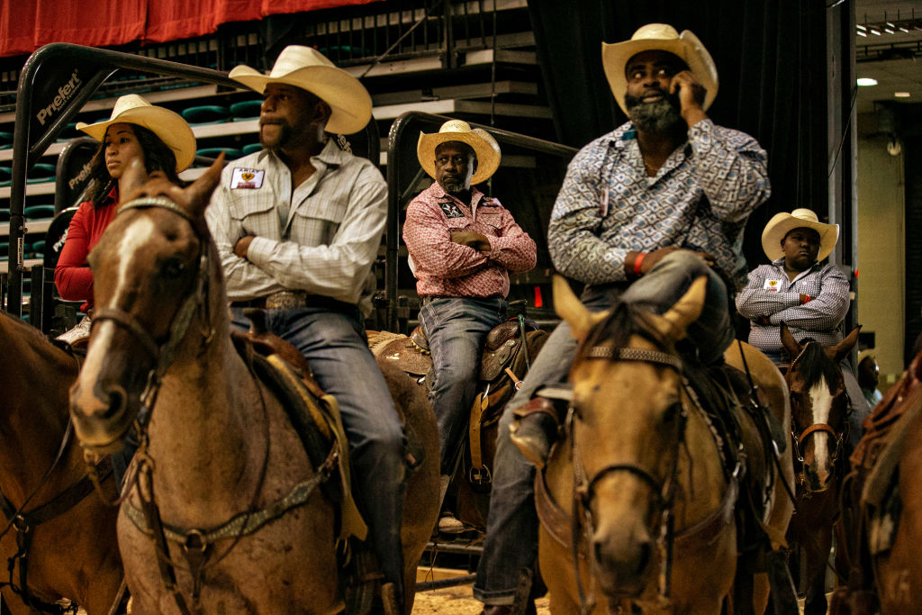 LAS VEGAS, CA - JUNE 13: A group of rodeo contestants wait for the final of the Bill Pickett Invitational Rodeo on Sunday, June 13, 2021 in Las Vegas, CA.