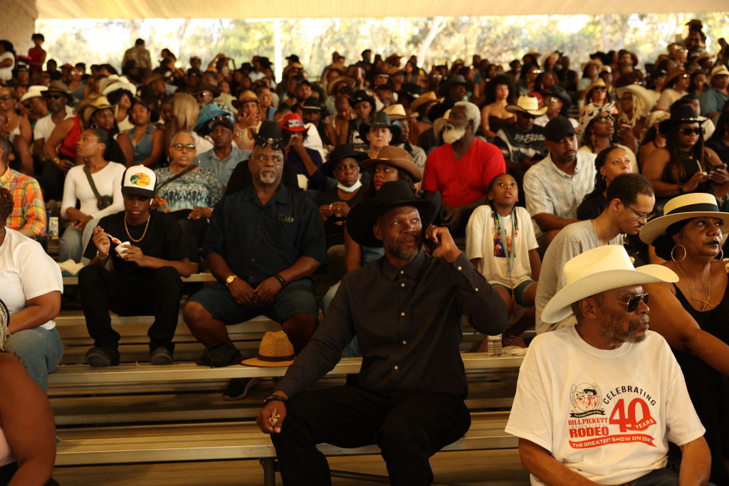 Industry, CA - July 20: People wait before the Bill Pickett Rodeo begins on Saturday, July 20, 2024 in Industry, CA.