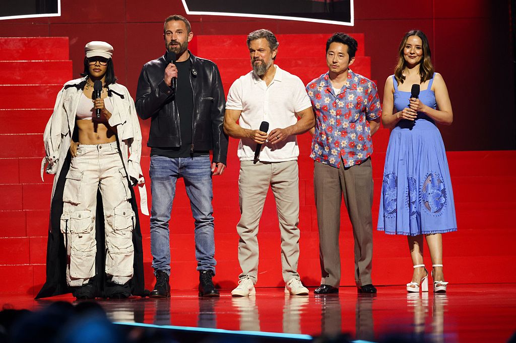 INGLEWOOD, CALIFORNIA - MAY 31: (L-R) Teyana Taylor, Ben Affleck, Matt Damon, Steven Yeun, and Catalina Sandino Moreno speak onstage during NETFLIX TUDUM 2025: THE LIVE EVENT at The Kia Forum on May 31, 2025 in Inglewood, California.