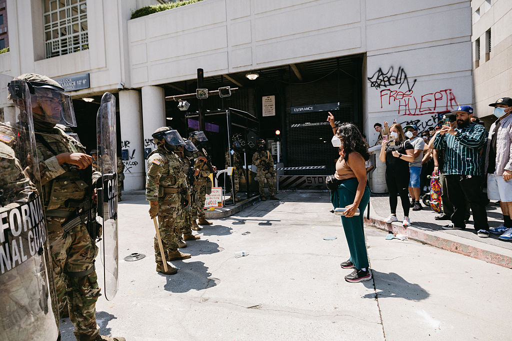 Demonstrators confront a line of National Guard troops during a protest in Los Angeles, California, on June 8, 2025. Tensions remain high after President Trump deployed federal forces despite opposition from local officials.