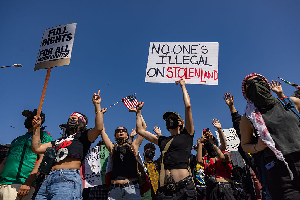 Los Angeles, CA - June 08: Protesters shutdown the 101 Freeway as they clash with law enforcement in downtown Los Angeles due to the immigration raids in L.A. on Sunday, June 8, 2025 in Los Angeles, CA.