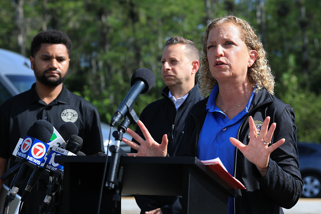 OCHOPEE, FLORIDA - JULY 12: (L-R) Rep. Maxwell Frost (D-FL), Rep. Jared Moskowitz (D-FL), and Rep. Debbie Wasserman Schultz (D-FL) hold a press conference before visiting "Alligator Alcatraz" at the Dade-Collier Training and Transition Airport on July 12, 2025, in Ochopee, Florida. Members of Congress were given their first visit to the new state-managed immigration detention facility in the Florida Everglades that officials have named “Alligator Alcatraz.” 