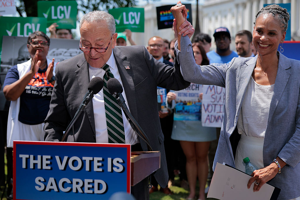 WASHINGTON, DC - JULY 29: Senate Minority Leader Charles Schumer (D-NY) and Maya Wiley, president and CEO of the Leadership Conference on Civil and Human Rights, join civil rights and voting rights advocates to reintroduce the John R. Lewis Voting Rights Advancement Act outside the U.S. Capitol on July 29, 2025 in Washington, DC. Sixty years after the late Rep. John Lewis (D-GA) was violently attacked crossing the Edmund Pettus Bridge in Selma, Alabama, the legislation that bears his name would restore and strengthen parts of the Voting Rights Act of 1965, including the requirement for states and jurisdictions with a history of voting rights violations to seek federal approval before enacting certain changes to their voting laws.