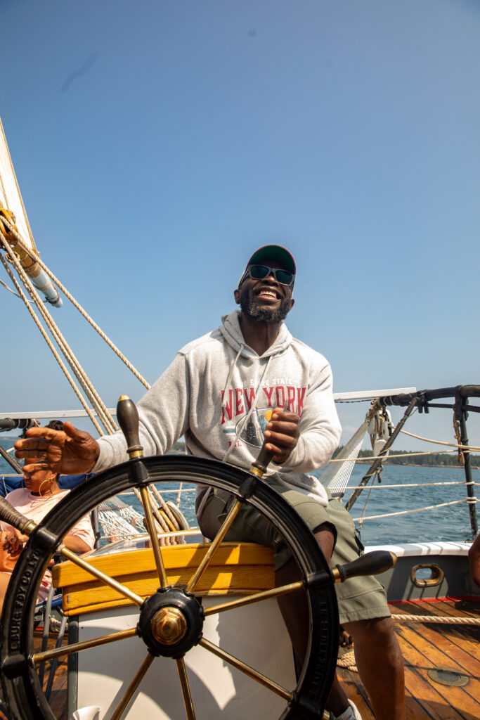 Sylvester Anyanwu aboard the Lewis R. French sailing throughout Maine